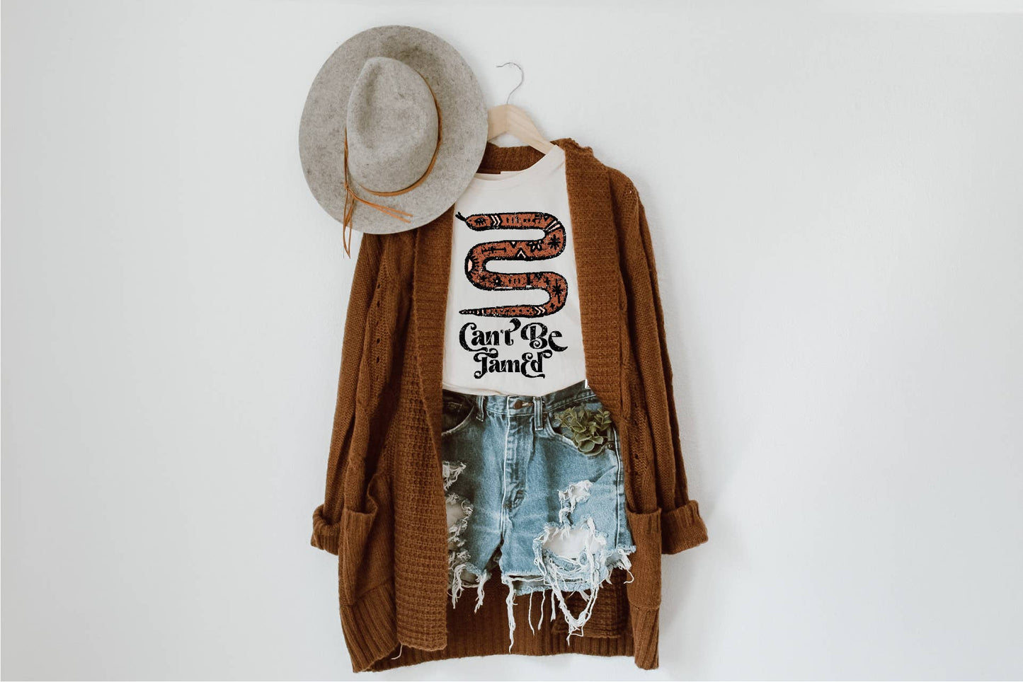 Can't Be Tamed Tee